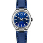 The Circular S - Blue Brushed by ID Geneve features a silver case, blue brushed dial, date display, and a matching blue leather strap.