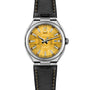 The Circular S - Sun Brushed by ID Geneve is a luxury wristwatch featuring a yellow dial, silver markers, and a black leather strap.