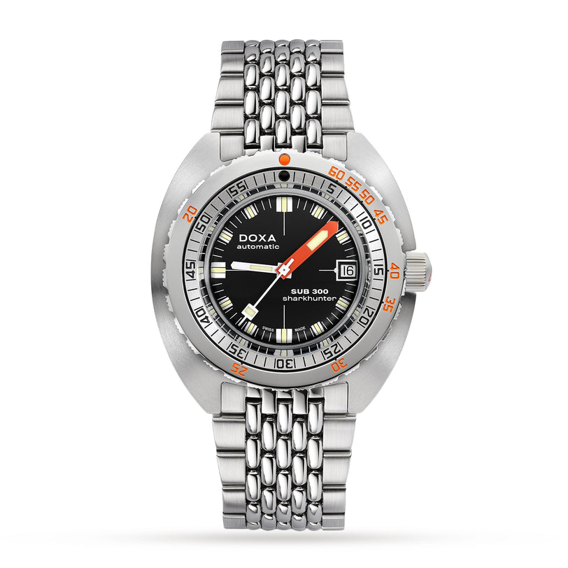 The DOXA Sub 300 Sharkhunter is a stainless steel dive watch featuring a black dial, date window, orange accents, and unidirectional bezel, displayed on a metal bracelet.