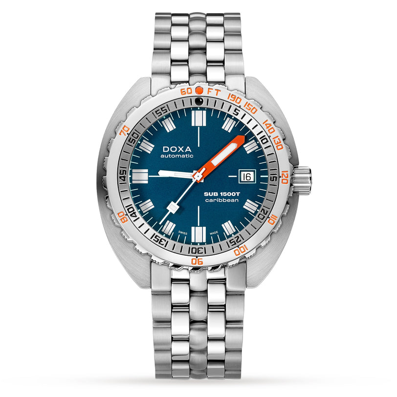 The DOXA Sub 1500T Caribbean is a stainless steel diver’s watch with a blue dial, date at 3 o’clock, orange and white accents, Super-LumiNova markers, and a metal link bracelet.