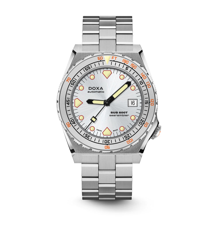 The DOXA Sub 600T Searambler is a stainless steel dive watch with a silver dial, bold orange accents, date at 3 o’clock, and metal bracelet—perfect for dependable performance on your next underwater adventure.