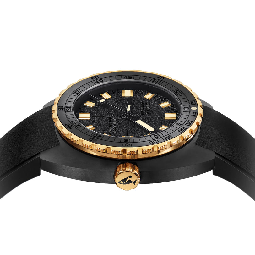 Side view of the DOXA Sub 300 Beta Sharkhunter, featuring a gold bezel, gold markers, black textured dial, black strap, and gold crown—a bold nod to classic dive watch design.