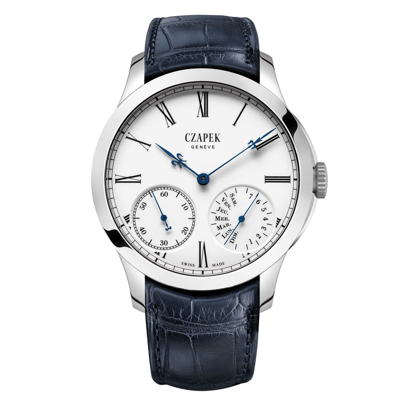 The Czapek Quai des Bergues N°33 Ter is a luxury watch featuring Roman numerals, blue hands, and a dark blue leather strap.