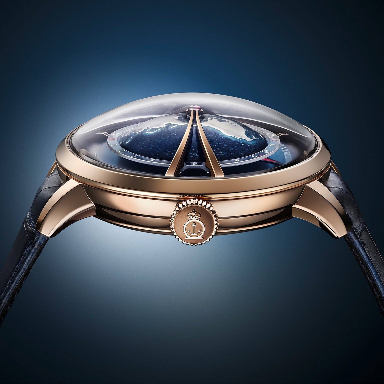 The Arnold & Son Globetrotter Red Gold is a luxury wristwatch featuring a domed glass case and a detailed, globe-inspired dial.