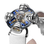 The MB&F HM11 Art Deco is a futuristic luxury watch featuring a metallic mechanical design, skeletonised dial with four rounded structures, exposed gears, and a white textured strap.