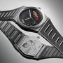 Luxury watch with detailed design on a gray background