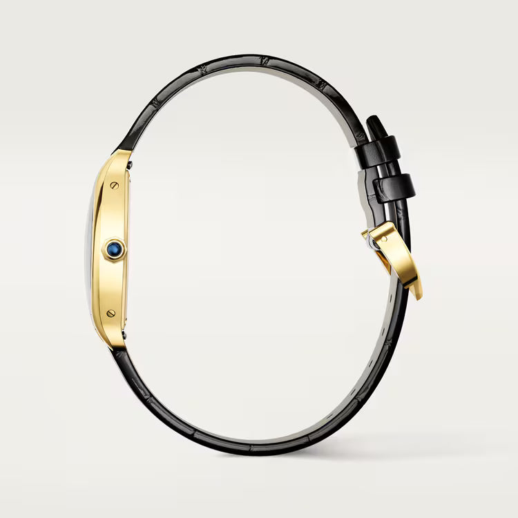 Black leather bangle bracelet with gold-tone metal cuff and buckle closure.
