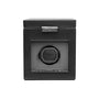 The WOLF Classic Single Watch Winder with Storage features a black square design, transparent front panel, and a silver latch on top.