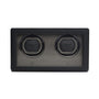 The WOLF Cub Double Watch Winder with Cover is a black rectangular winder featuring a glass front that displays two watch slots.