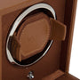 Close-up of the WOLF Cub Single Watch Winder with Cover, featuring brown textured leather padding and chrome trim.