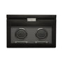 The WOLF Classic Single Watch Winder with Storage features a black leather exterior, a glass front, and space to wind one watch with additional storage inside.