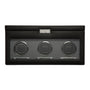 The WOLF Classic Triple Watch Winder with Storage features a glass front displaying three winding slots for watches.