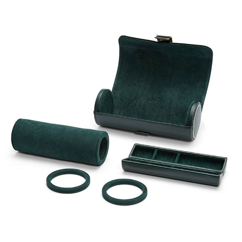 The WOLF British Racing Triple Watch Roll is a green velvet travel case featuring a removable tray and two separate circular inserts.