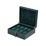 The WOLF British Racing 8 Piece Watch Box in dark green, featuring velvet-lined compartments, is displayed open on a white background.