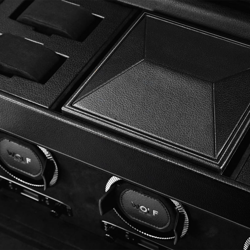 Close-up of the WOLF British Racing Triple Watch Winder with Storage, featuring visible compartments and WOLF branding on two dials.