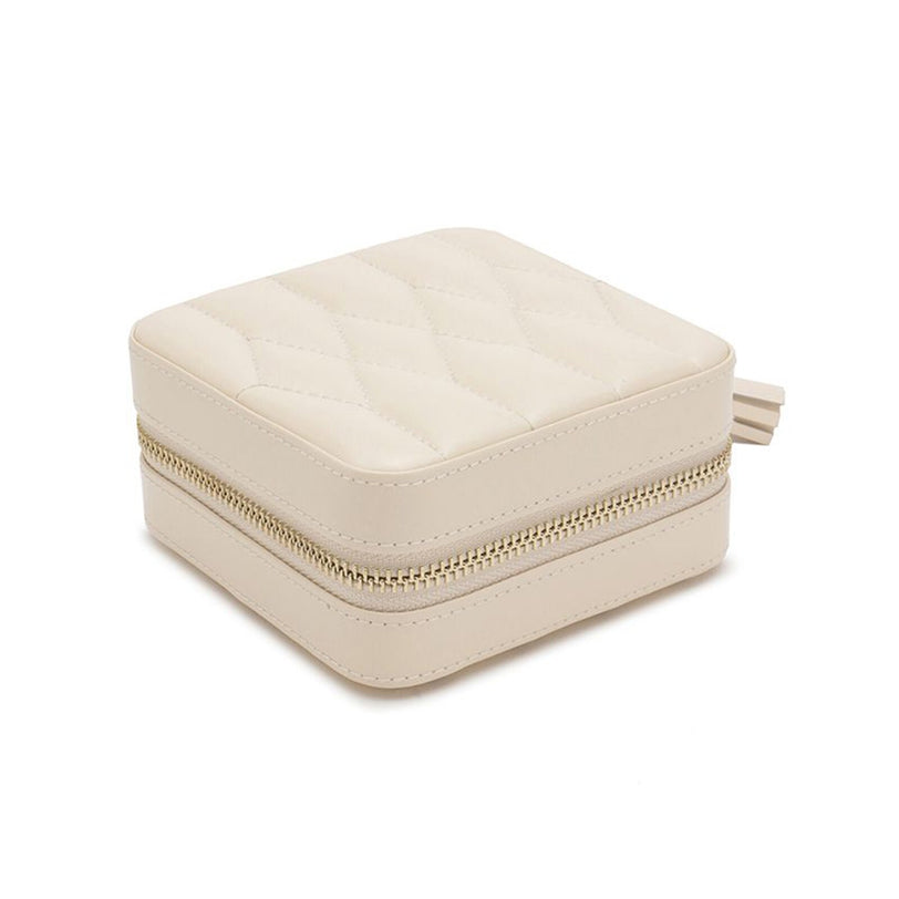 WOLF Caroline Zip Travel Case, a beige quilted square jewelry box with zipper closure, displayed on a white background.