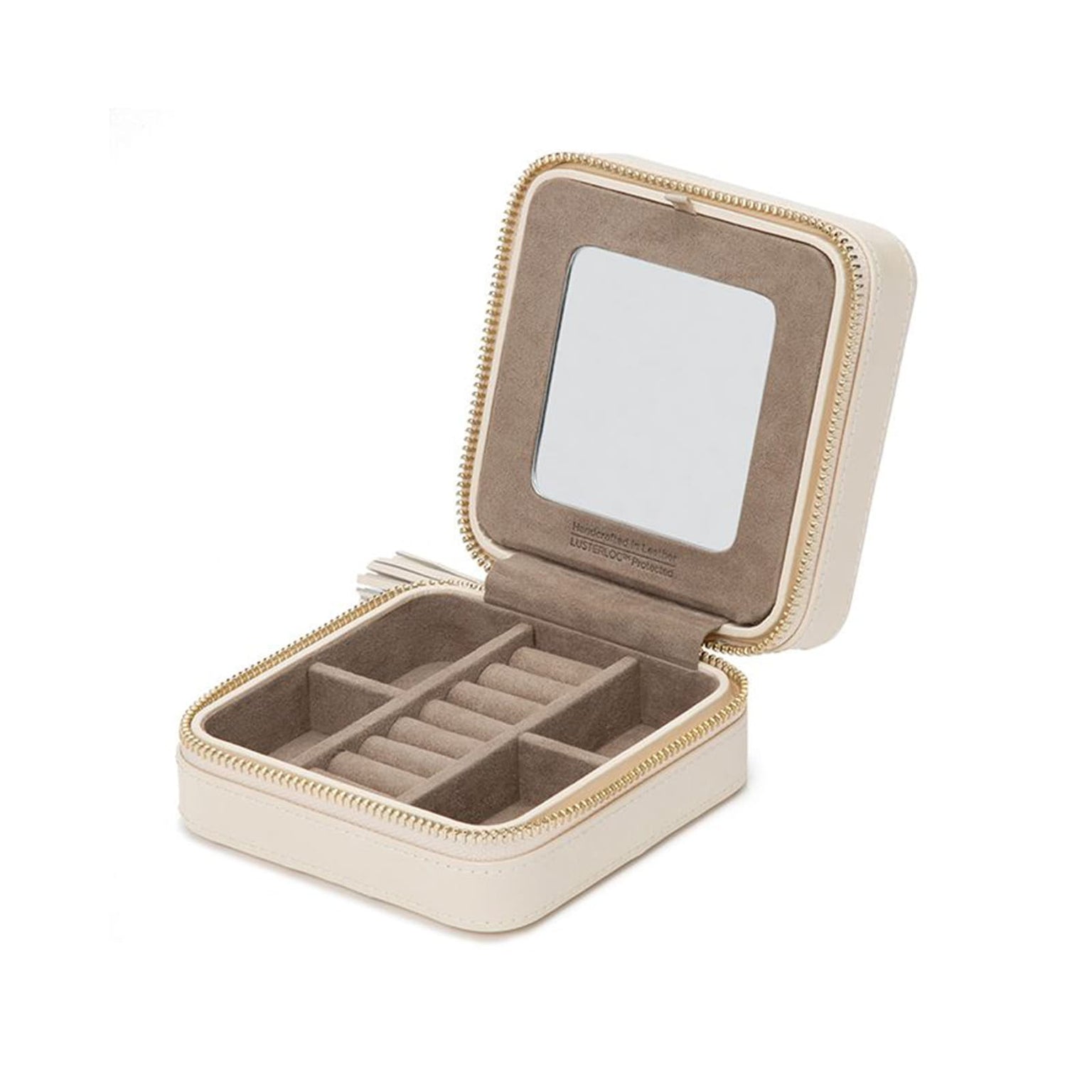 The WOLF Caroline Zip Travel Case, a beige jewelry box with compartments and an interior mirror, is shown open on a white background.