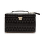 The Caroline Large Jewellery Case by WOLF features black quilted leather, a top handle, silver clasp, and a geometric diamond pattern.