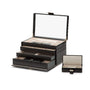 The WOLF Caroline Large Jewellery Case, shown with its lid open and featuring multiple drawers and compartments, sits beside a matching smaller box.