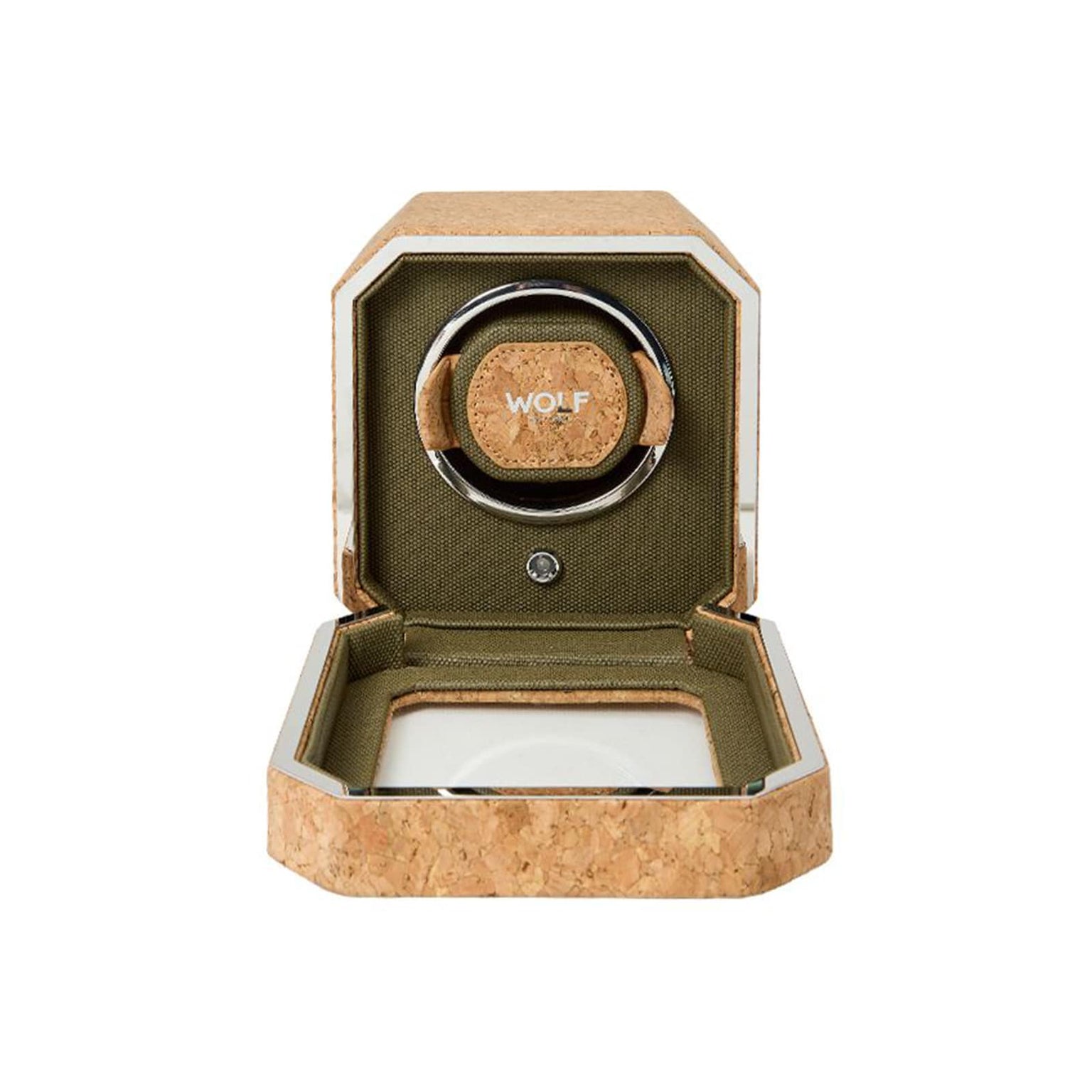A WOLF Cortica Single Watch Winder box in cork and green sits with its lid open, revealing an empty holder inside.