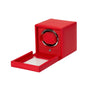 The WOLF Cub Single Watch Winder with Cover features a red design and an open glass lid, displaying the watch holder inside.