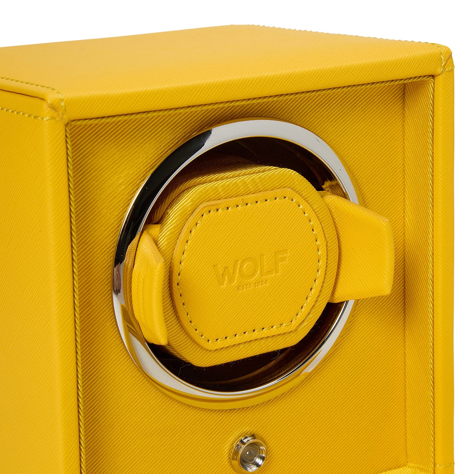 The WOLF Cub Single Watch Winder with Cover features a yellow finish, a round metal frame, and a coordinating yellow watch holder inside.