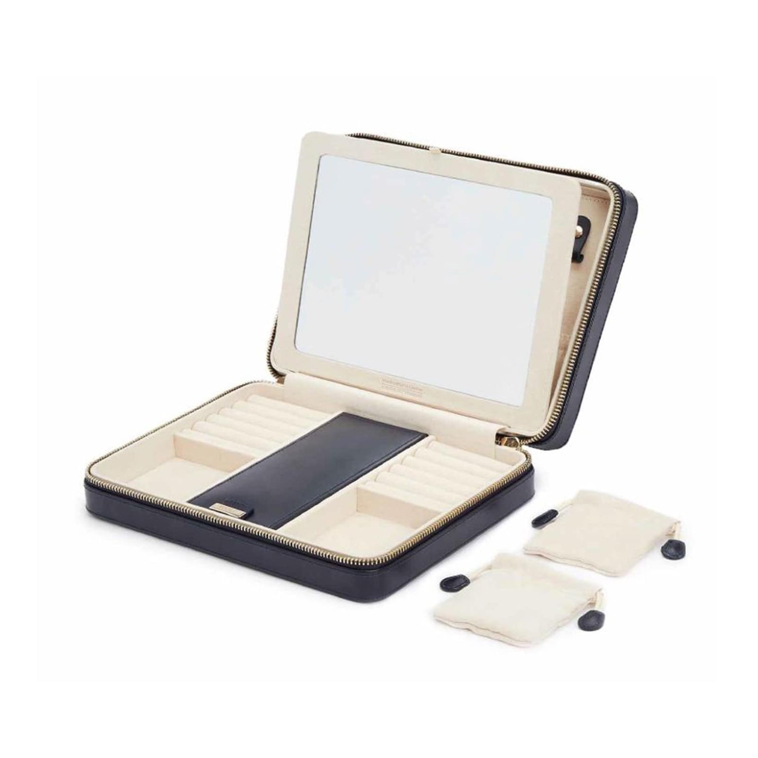 The WOLF Maria Large Zip Case, shown open with mirror and compartments, is displayed alongside two small beige drawstring pouches.