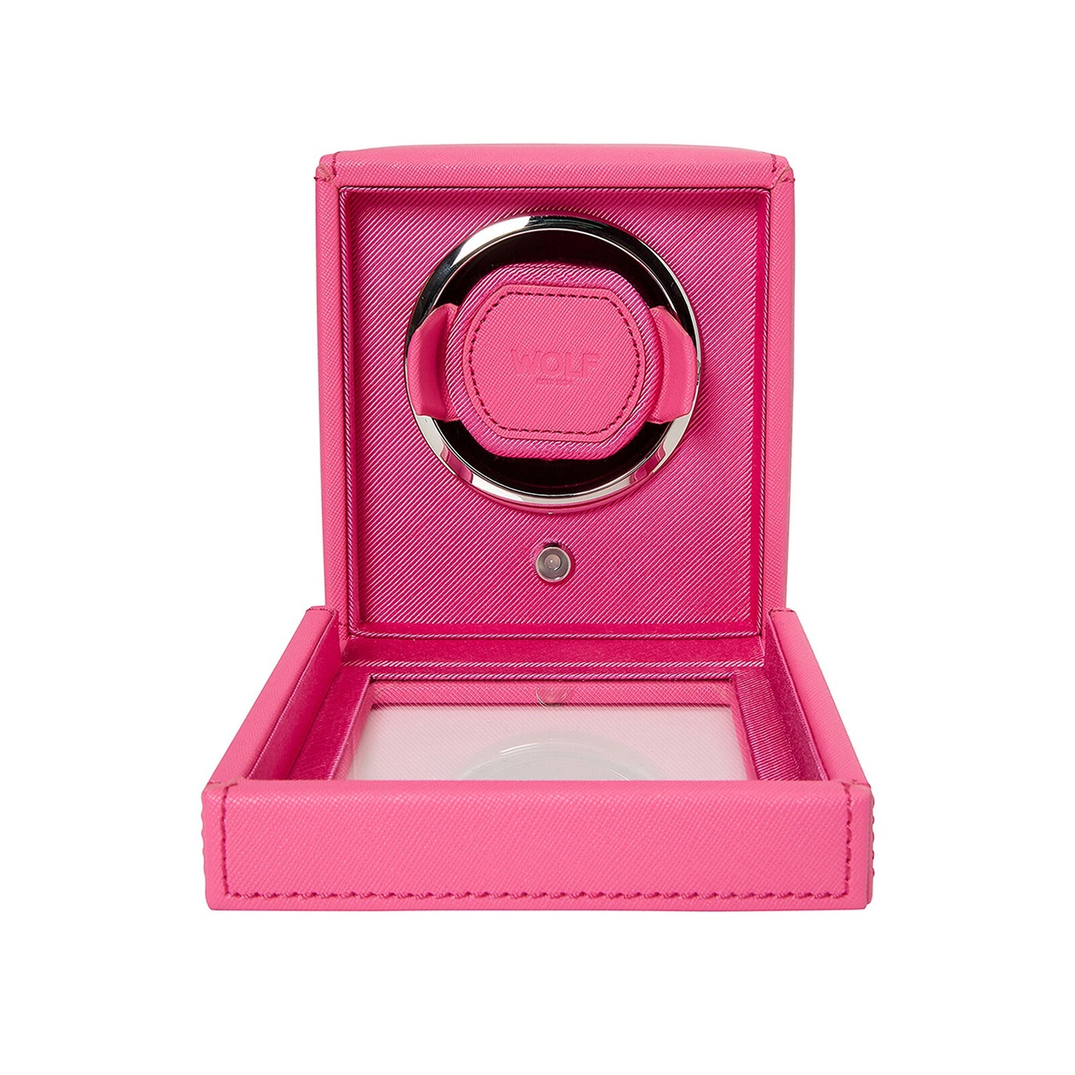 The WOLF Cub Single Watch Winder with Cover is shown open, revealing its circular holder inside. The bright pink finish adds a stylish touch to this elegant watch accessory.