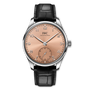 IWC watch with a black leather strap and rose gold dial on a white background