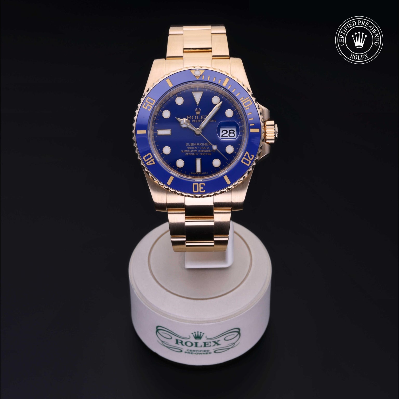 Rolex Certified Pre-owned Submariner M116618LB-0003 front on black background