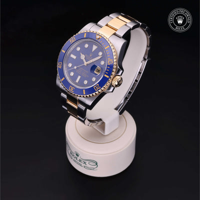 Rolex Certified Pre-owned Submariner M116613LB-0003 front on black background