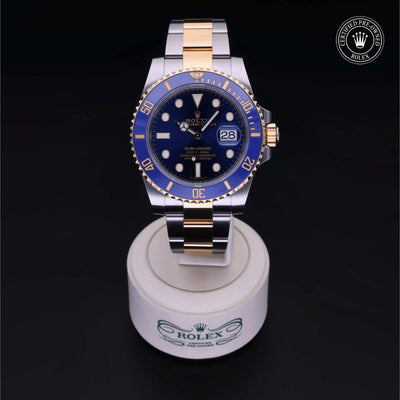 Rolex Certified Pre-owned Submariner M116613LB-0005 front on black background