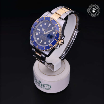 Rolex Certified Pre-owned Submariner M116613LB-0005 front on black background