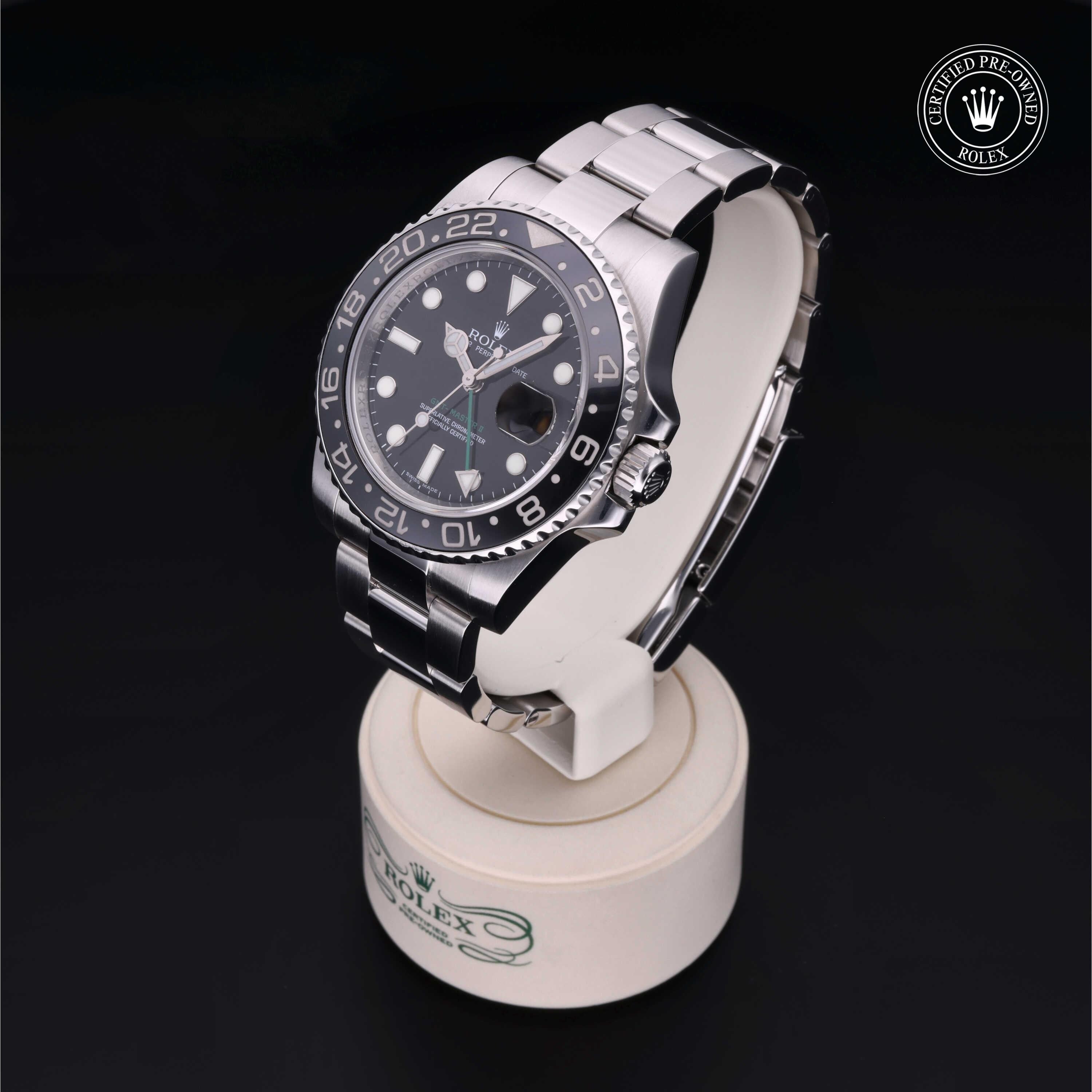 Rolex Certified Pre-owned GMT M116710LN-0001 front on black background