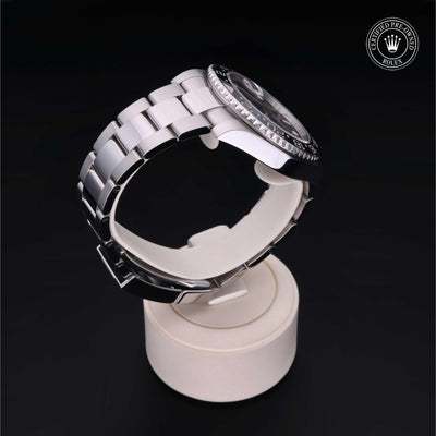 Rolex Certified Pre-owned GMT M116710LN-0001 front on black background