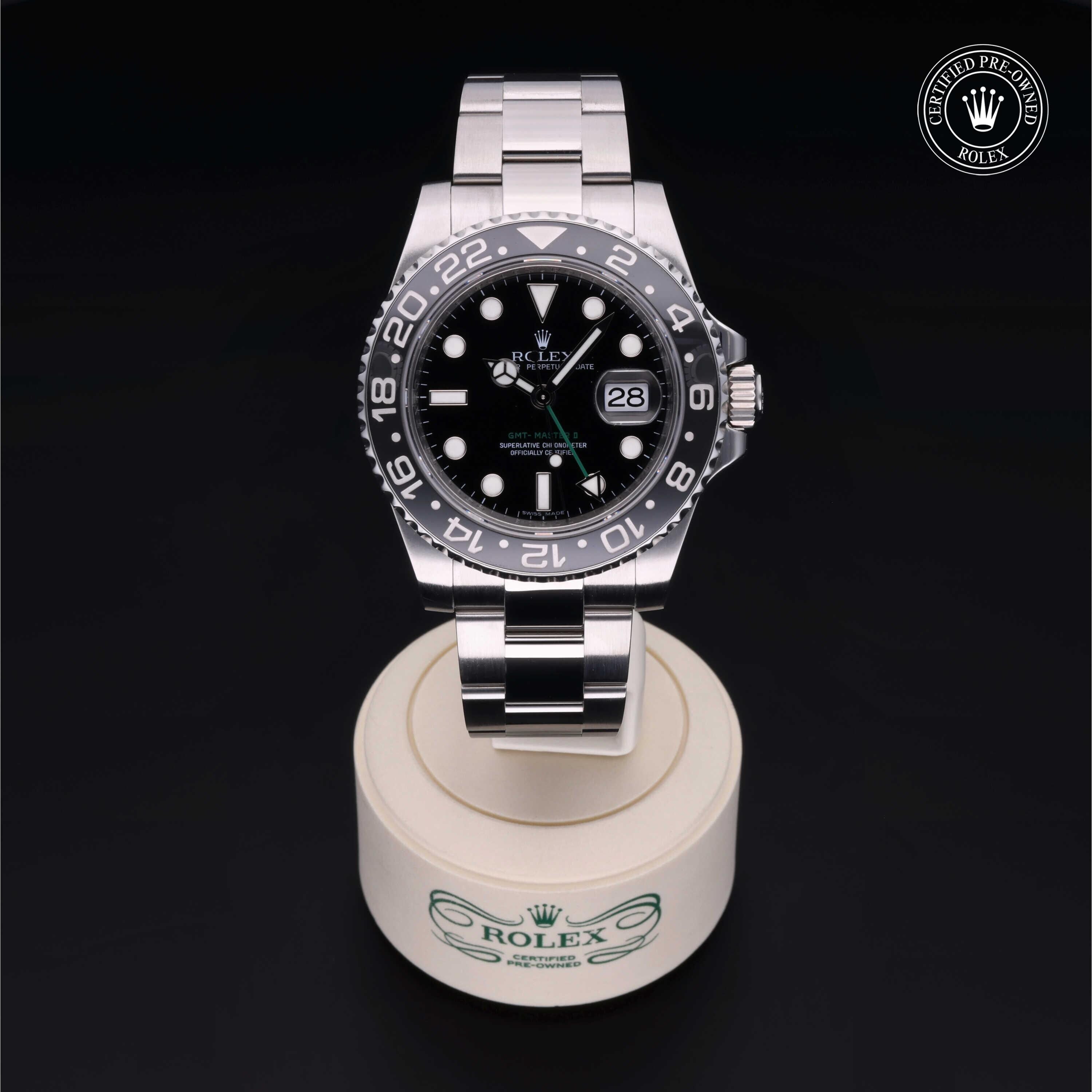 Rolex Certified Pre-owned GMT II M116710LN-0001 front on black background
