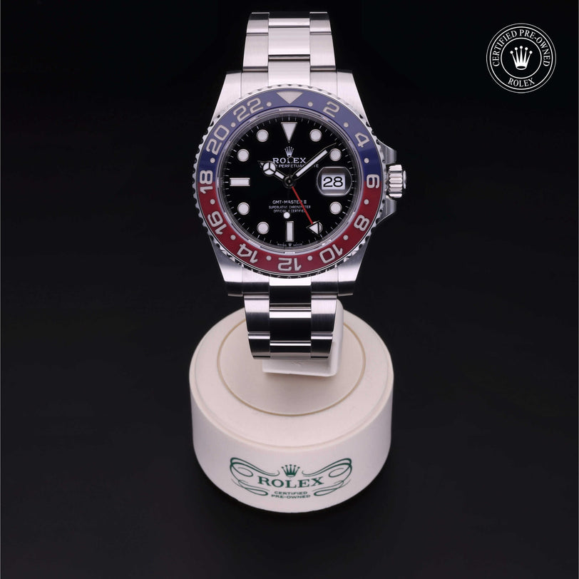 Rolex Certified Pre-owned GMT M126710BLRO-0002 front on black background