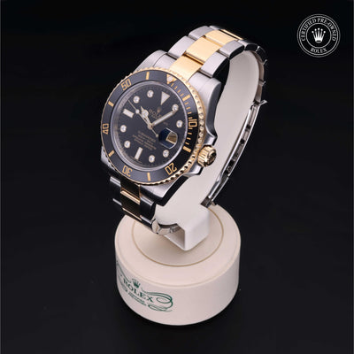 Rolex Certified Pre-owned Submariner M116613LN-0003 front on black background