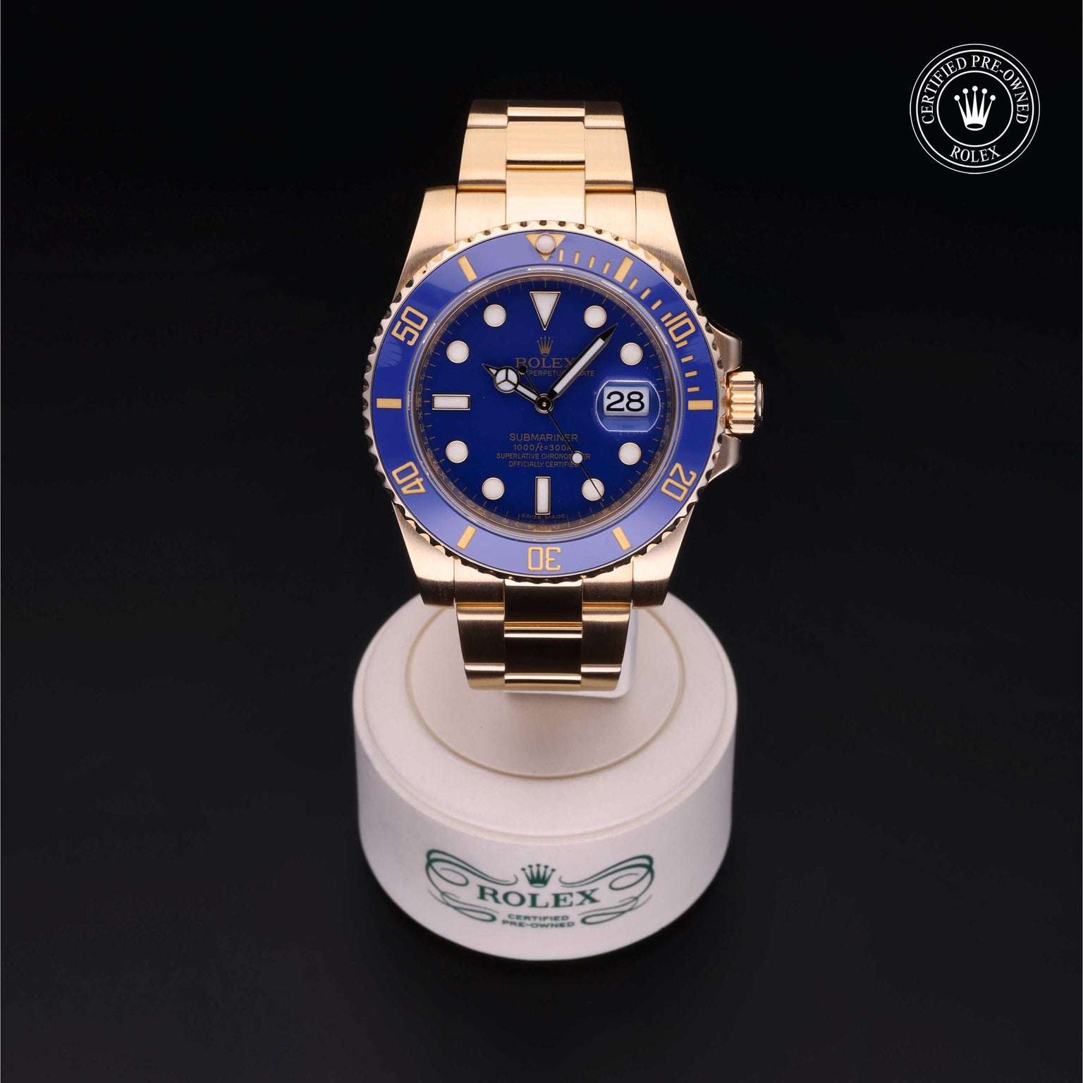 Rolex Certified Pre-owned Submariner M116618LB-0001 front on black background
