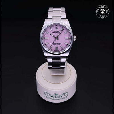 Rolex Certified Pre-owned Oyster Perpetual M126000-0008 front on black background