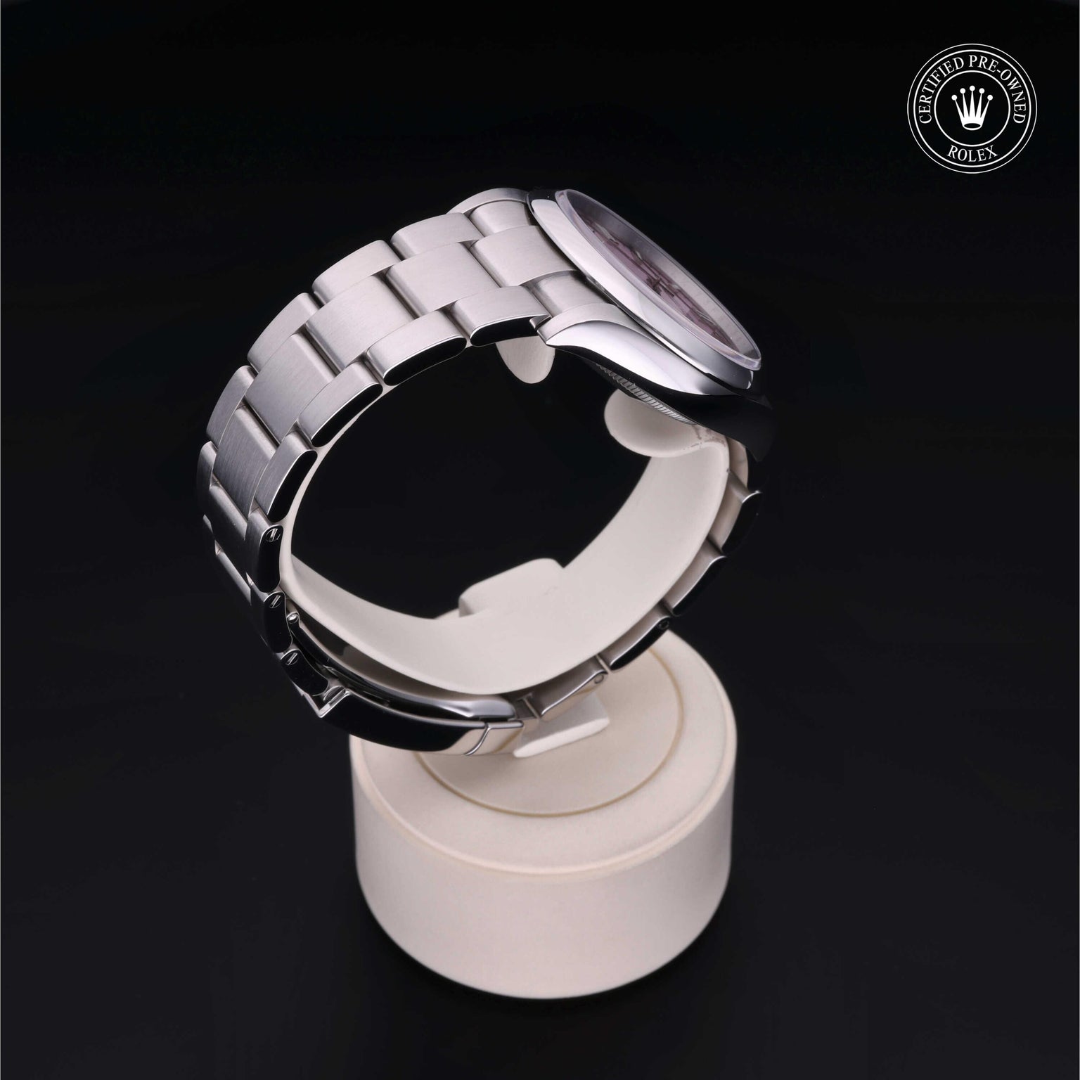 Rolex Certified Pre-owned Oyster Perpetual M126000-0008 front on black background