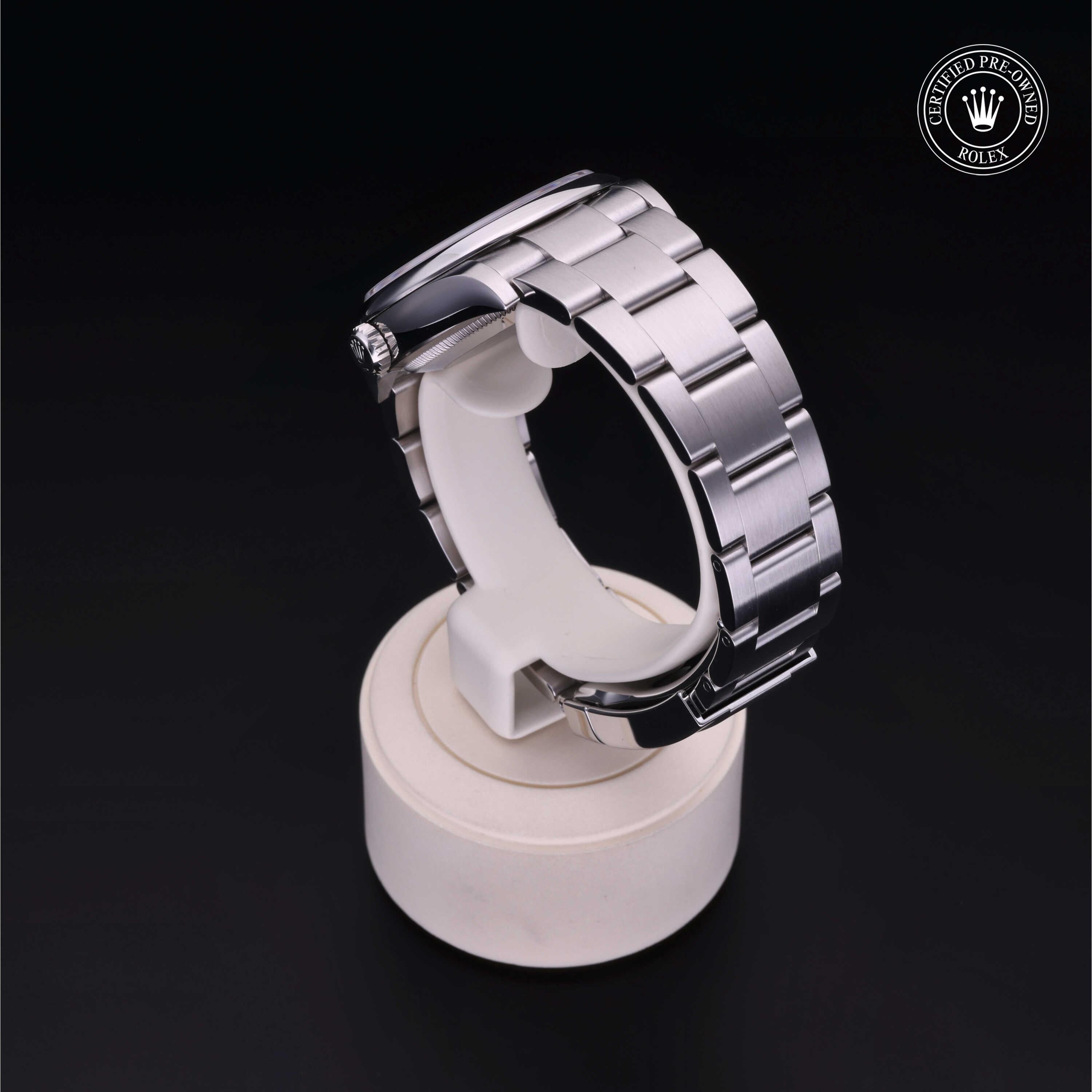 Rolex Certified Pre-owned Oyster Perpetual M126000-0008 front on black background