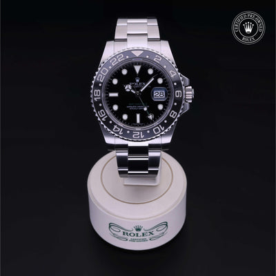 Rolex Certified Pre-owned GMT M116710LN-0001 front on black background