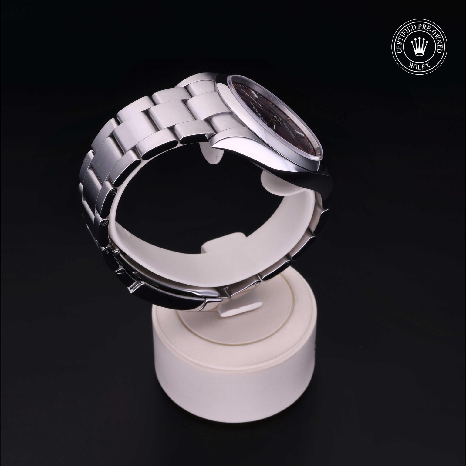 Rolex Certified Pre-owned Oyster Perpetual M114300-0002 front on black background