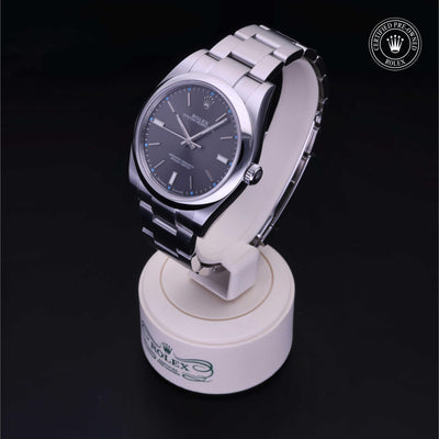 Rolex Certified Pre-owned Oyster Perpetual M114300-0001 front on black background