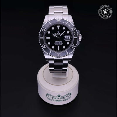 Rolex Certified Pre-owned Submariner M126610LN-0001 front on black background