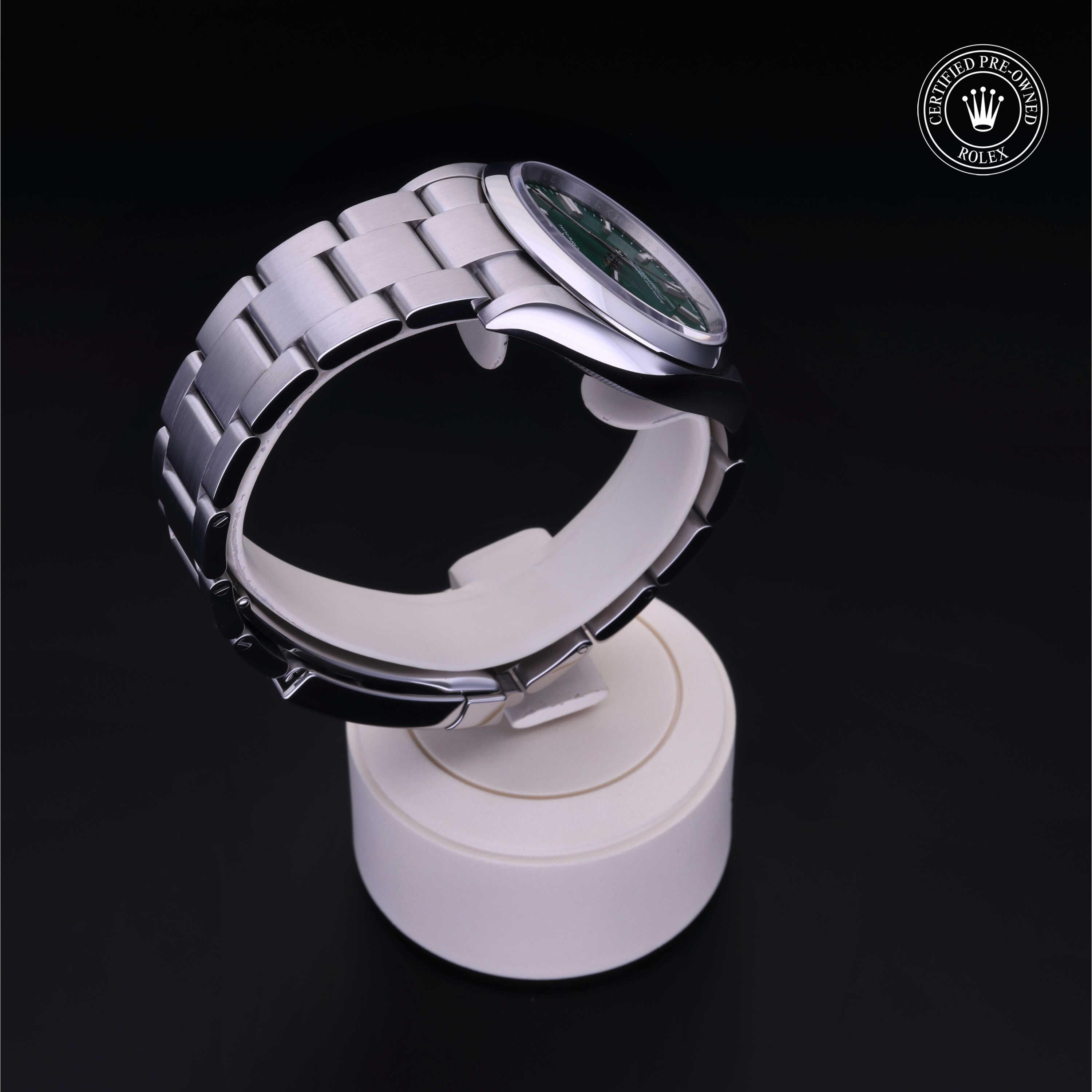 Rolex Certified Pre-owned Oyster Perpetual M126000-0005 front on black background