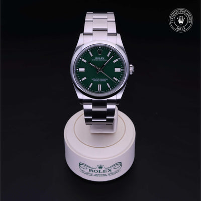 Rolex Certified Pre-owned Oyster Perpetual M126000-0005 front on black background