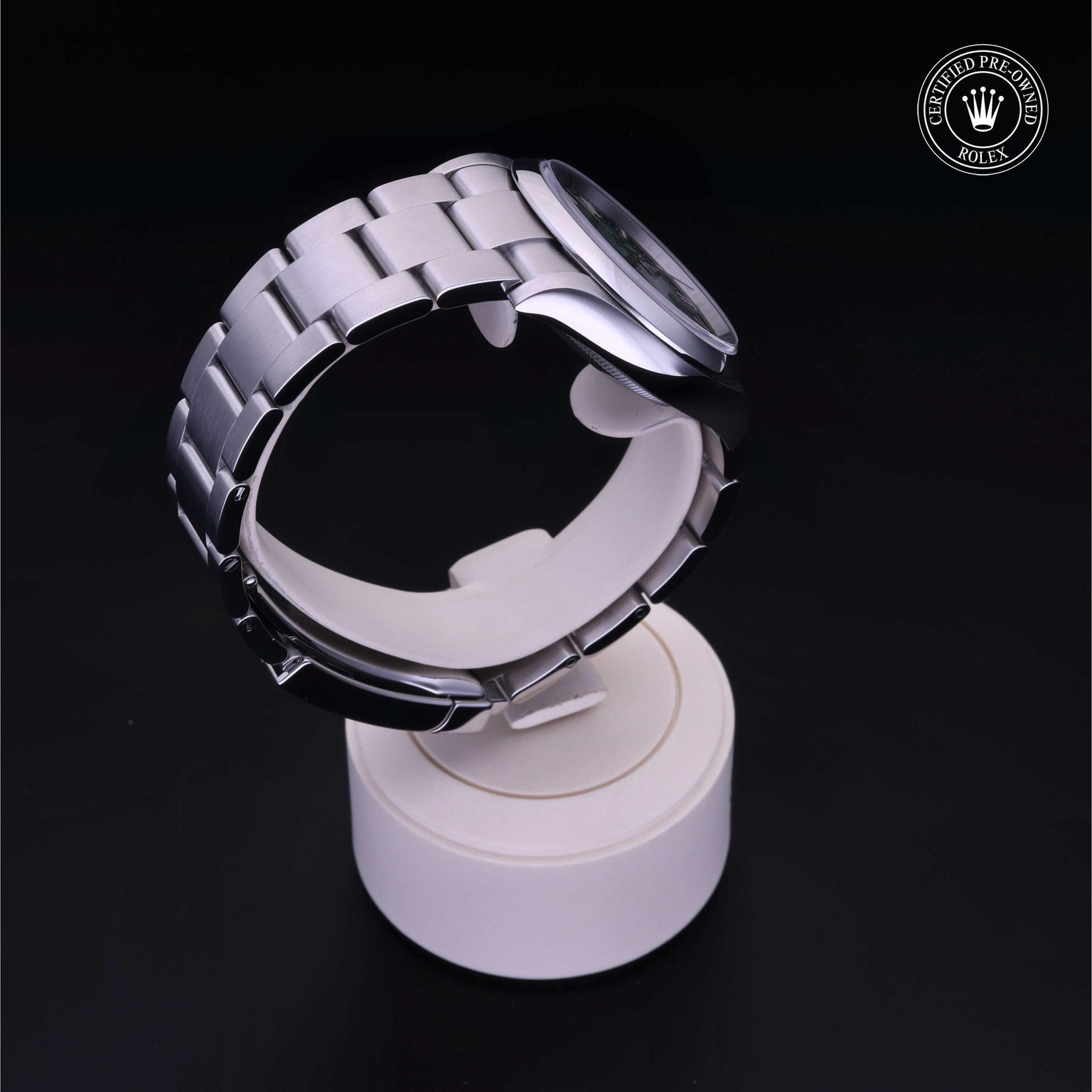 Rolex Certified Pre-owned Oyster Perpetual M126000-0005 front on black background