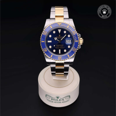 Rolex Certified Pre-owned Submariner M116613LB-0005 front on black background